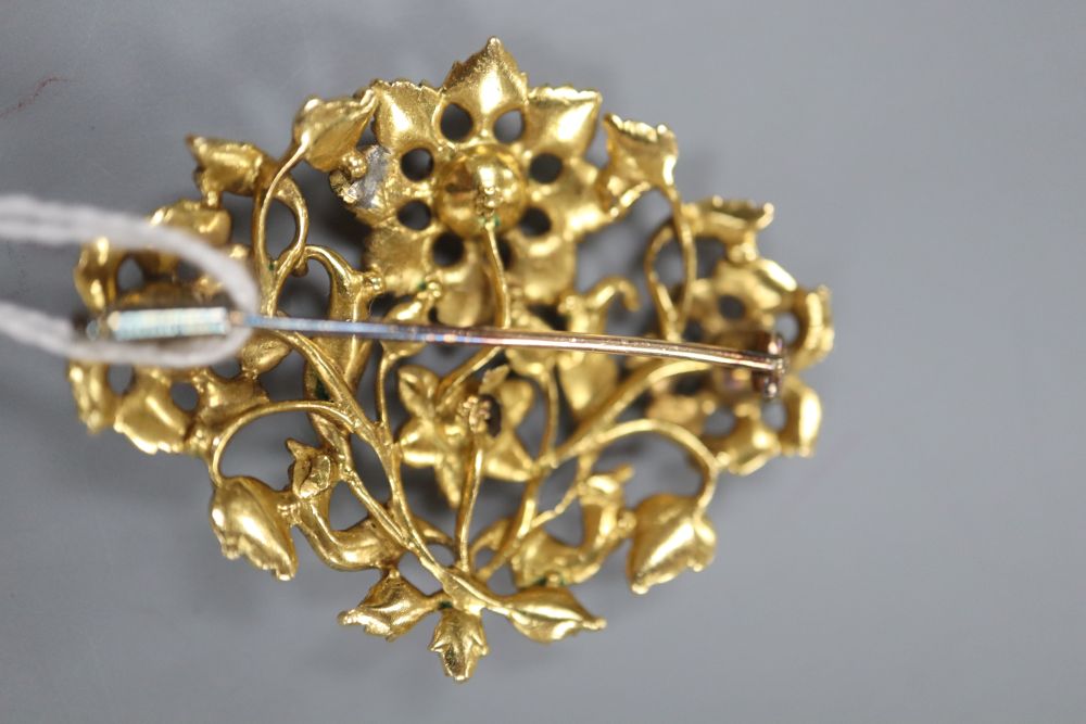 A continental yellow metal and rose cut diamond set foliate pendant brooch,(lead solder repair verso), 44mm, gross 14.3 grams.